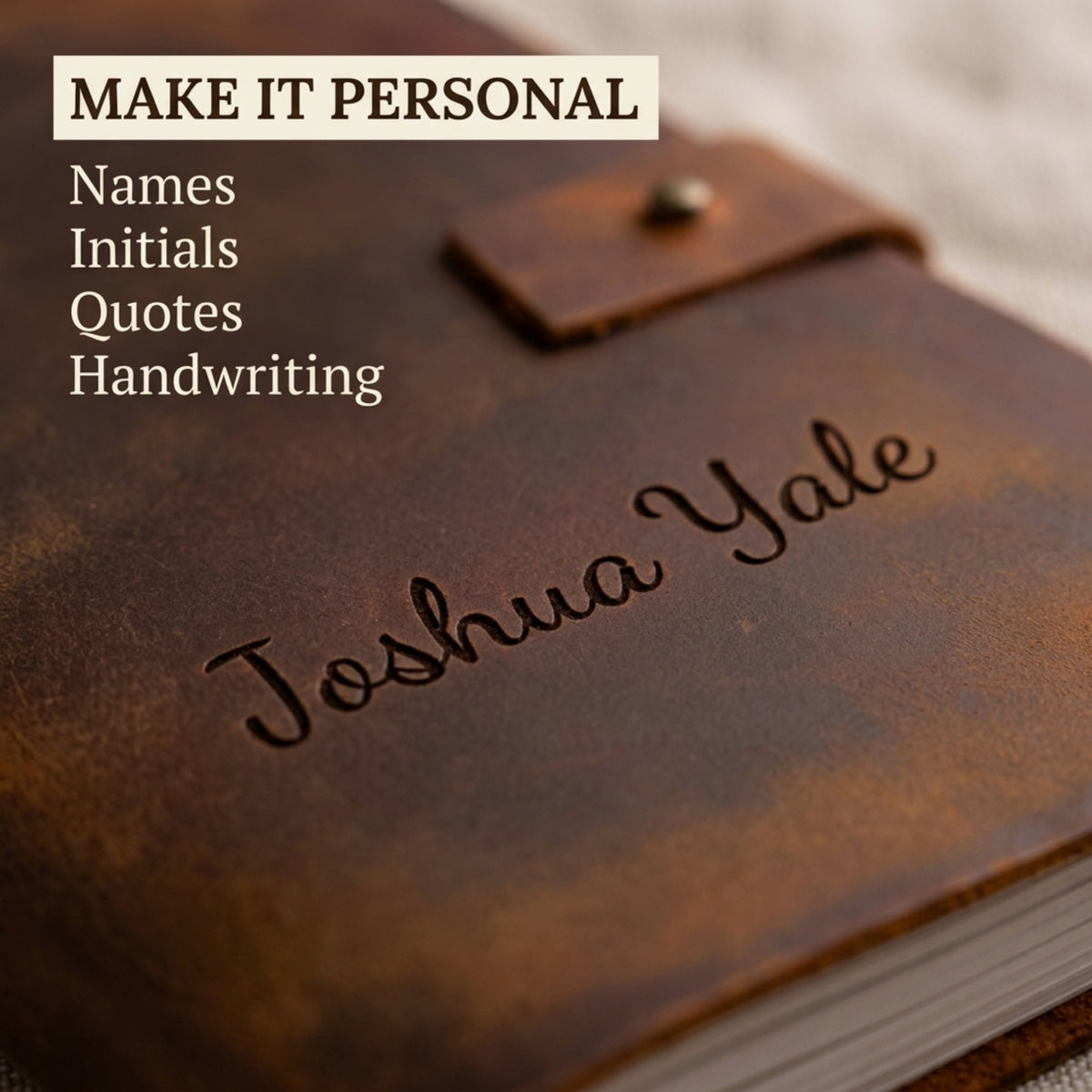 Brown leather notebook with 'Joshua Yale' engraved on it, with text overlay 'MAKE IT PERSONAL'.
