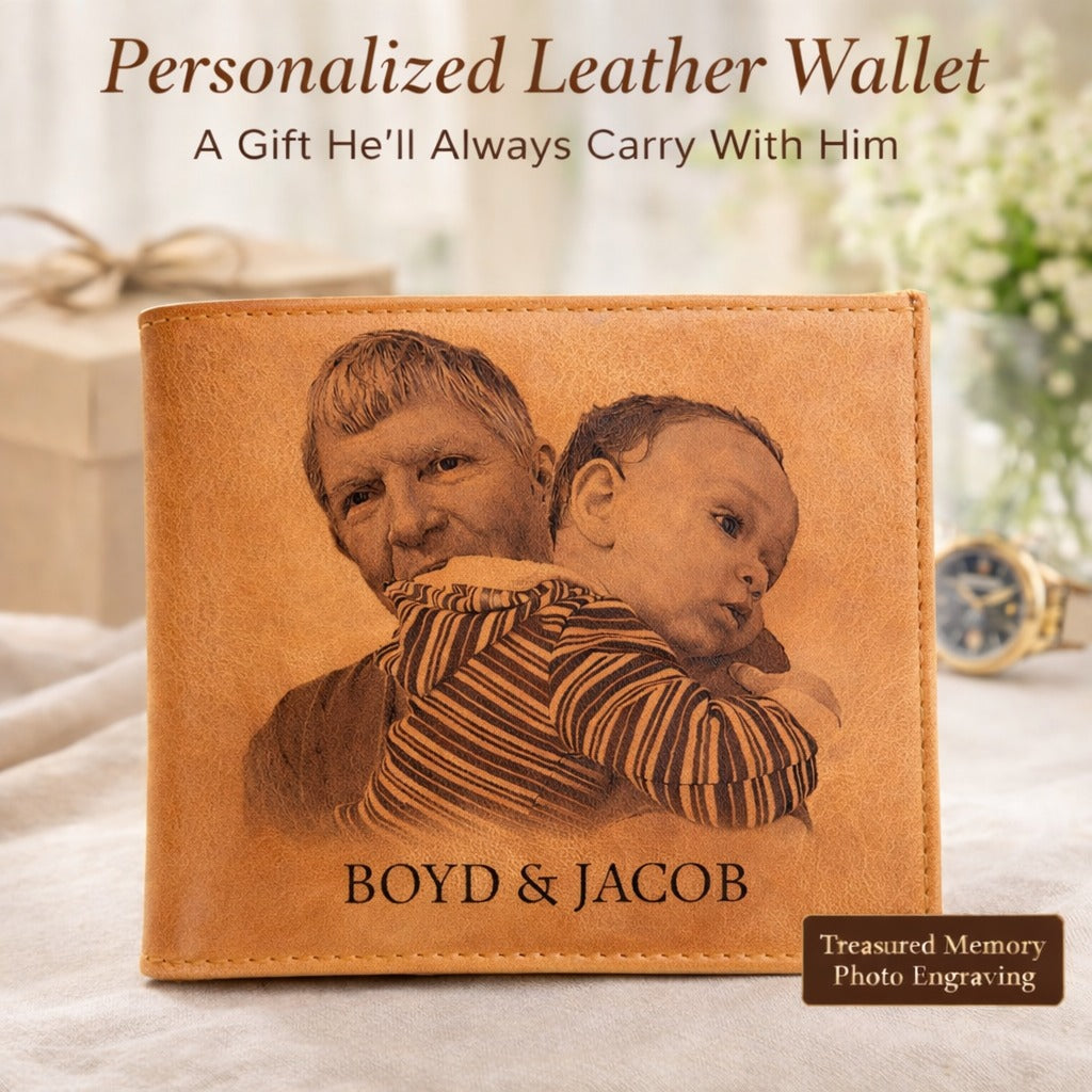 Personalized leather wallet with engraved photo of a man and a child, placed on a surface with a blurred background.