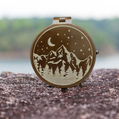engraved compass gift with mountains