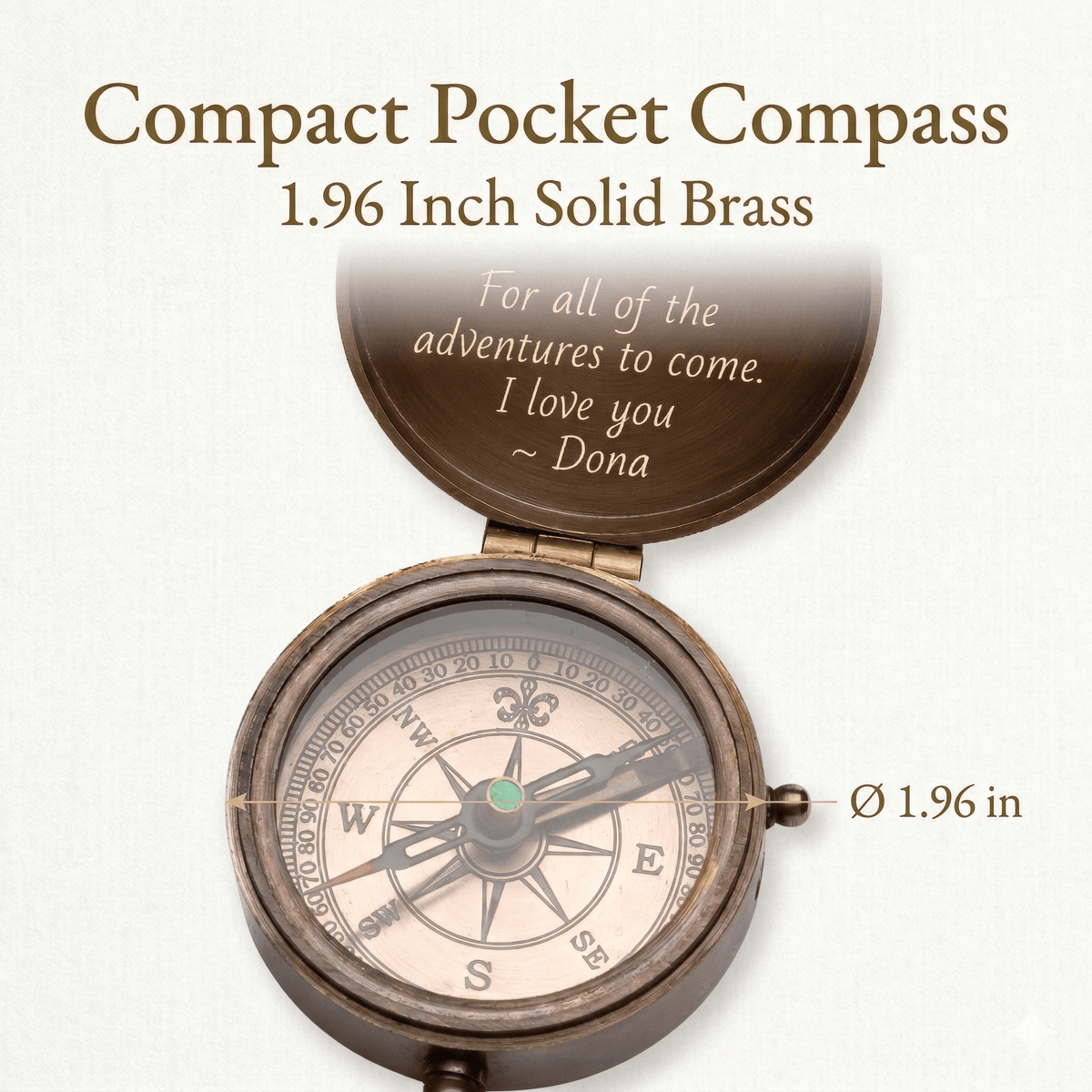 Compact pocket compass with engraved message on a white background