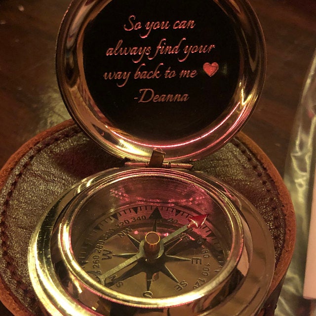 engraved compass with heart image